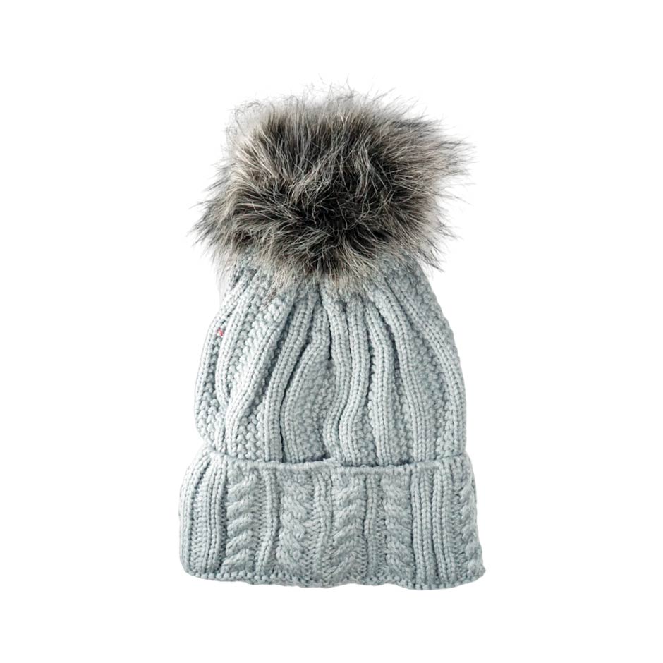 Women's hat with a pom-pom